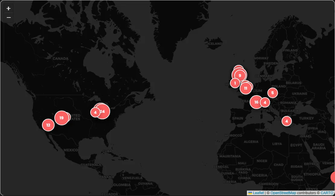 The photo map: a world map with red circular markers showing photo counts across Scotland, Europe, and the United States