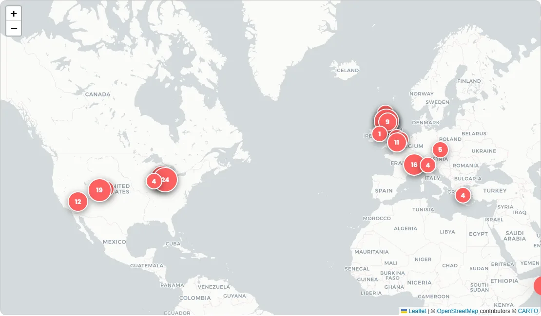 The photo map: a world map with red circular markers showing photo counts across Scotland, Europe, and the United States