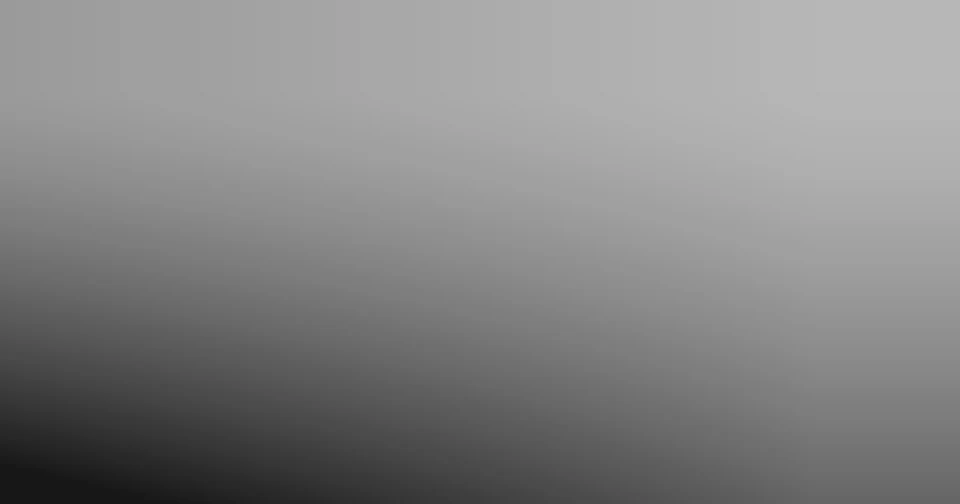 A rectangle shading from light grey at the top to near black at the bottom, darker on the left