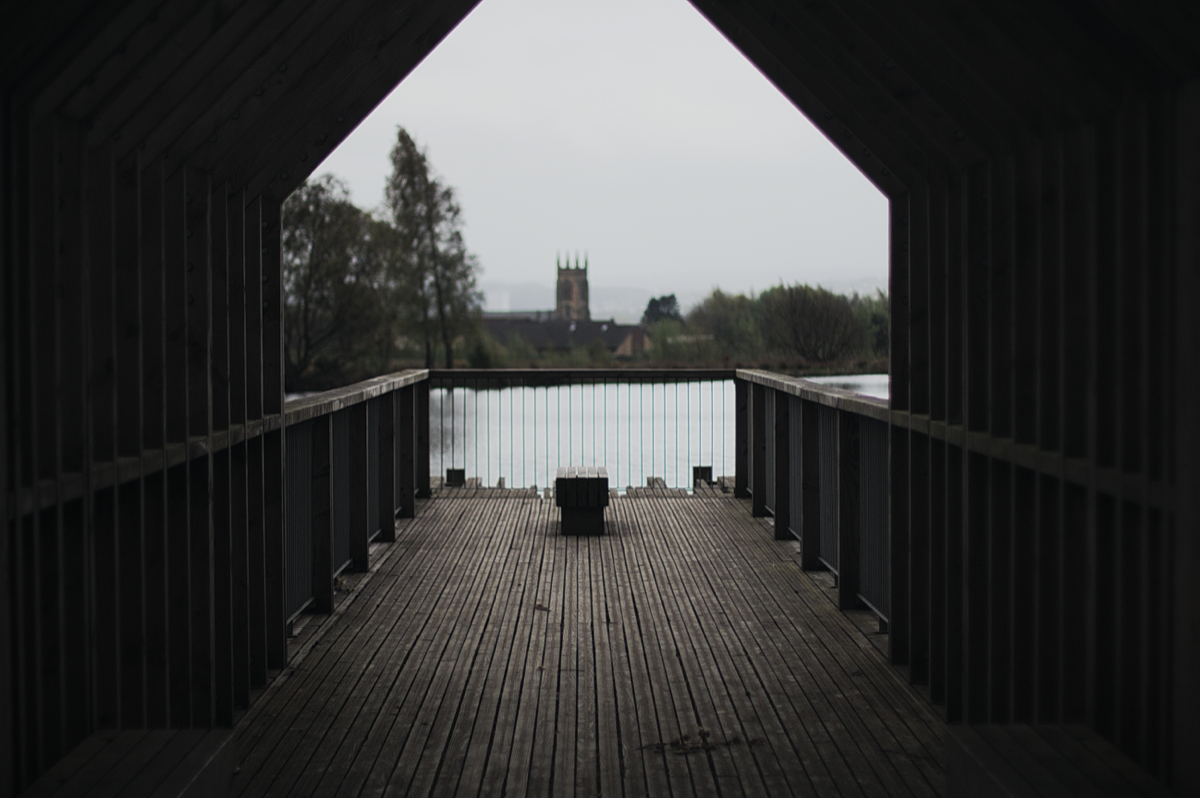 A bridge or a pier, representing a path forward.