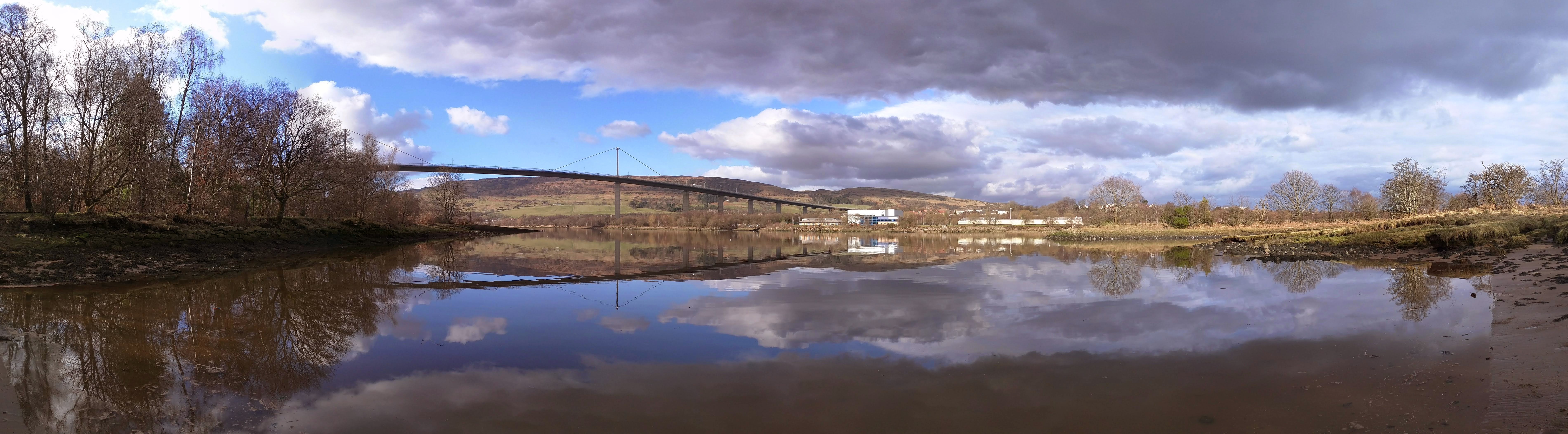 A photograph of Erskine, Scotland, the river running under a bridge next to the HP campus.
