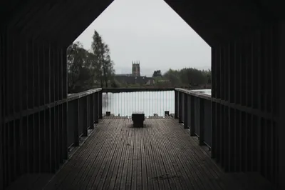 A bridge or a pier, representing a path forward.